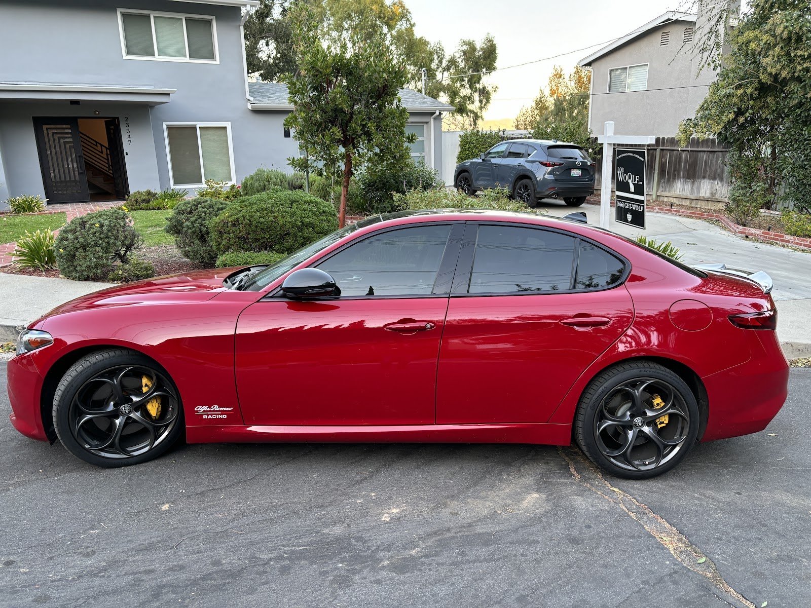 Red Alfa Romeo sedan finished at Sako's Auto Repair
